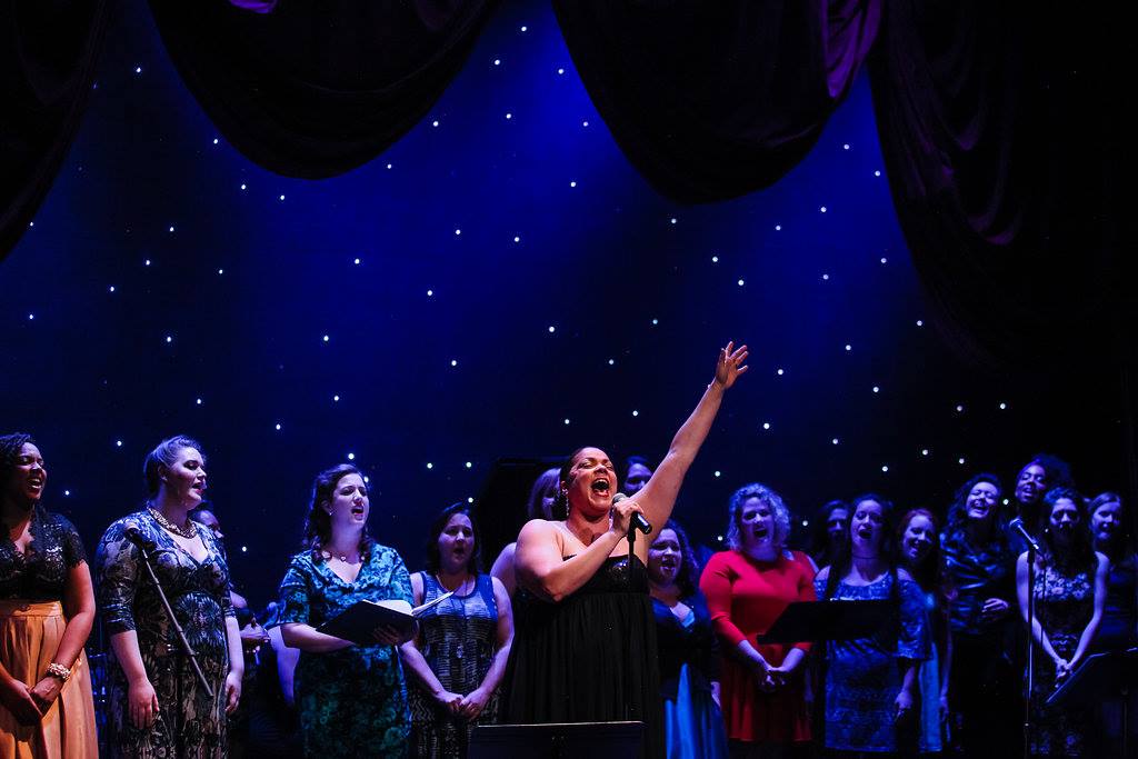 Firebrand Theatre ensemble performing at a benefit concert